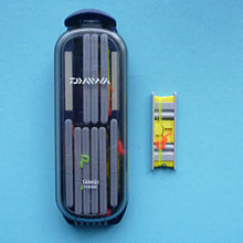 Daiwa 1500SK Keiryu Line Holder, with nine of it's small line winders inside the plastic case, and one outside the case.