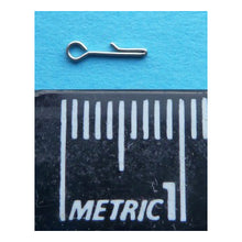 Owner Microfishing Tippet Connector with metric ruler, showing that it is 7mm long.